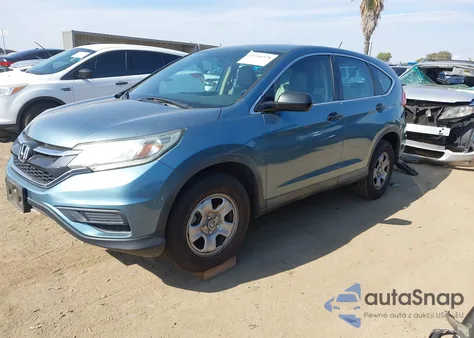 2015 Honda Cr-V Lx z USA, uszkodzony, nr VIN 2HKRM3H35FH556344